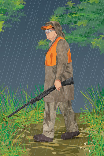 Hunter wearing rain gear